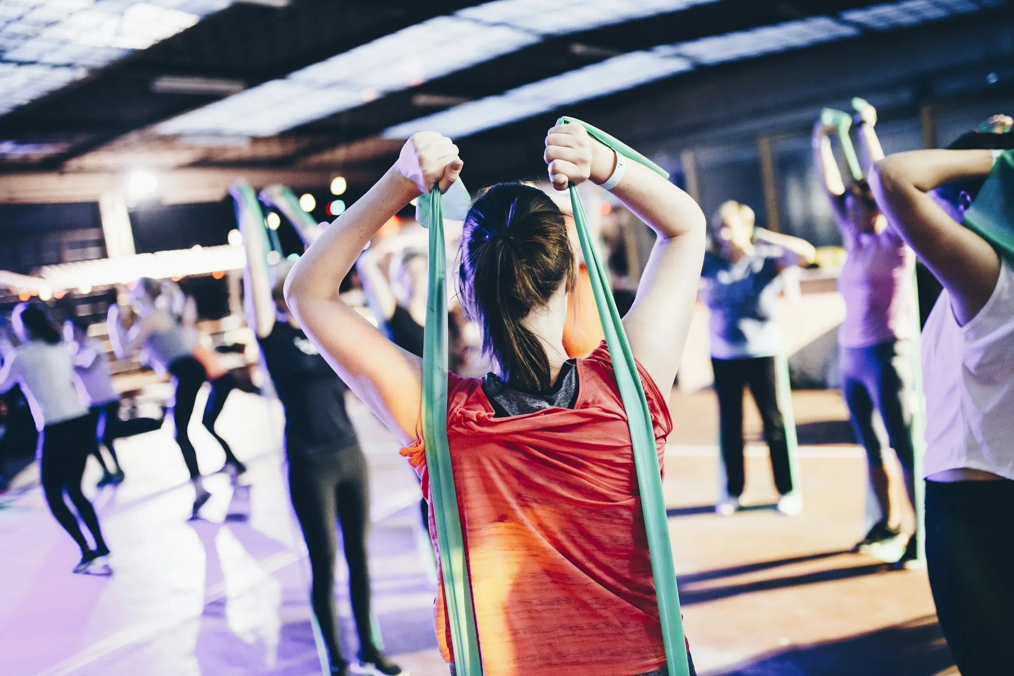 Packed group class mid-workout